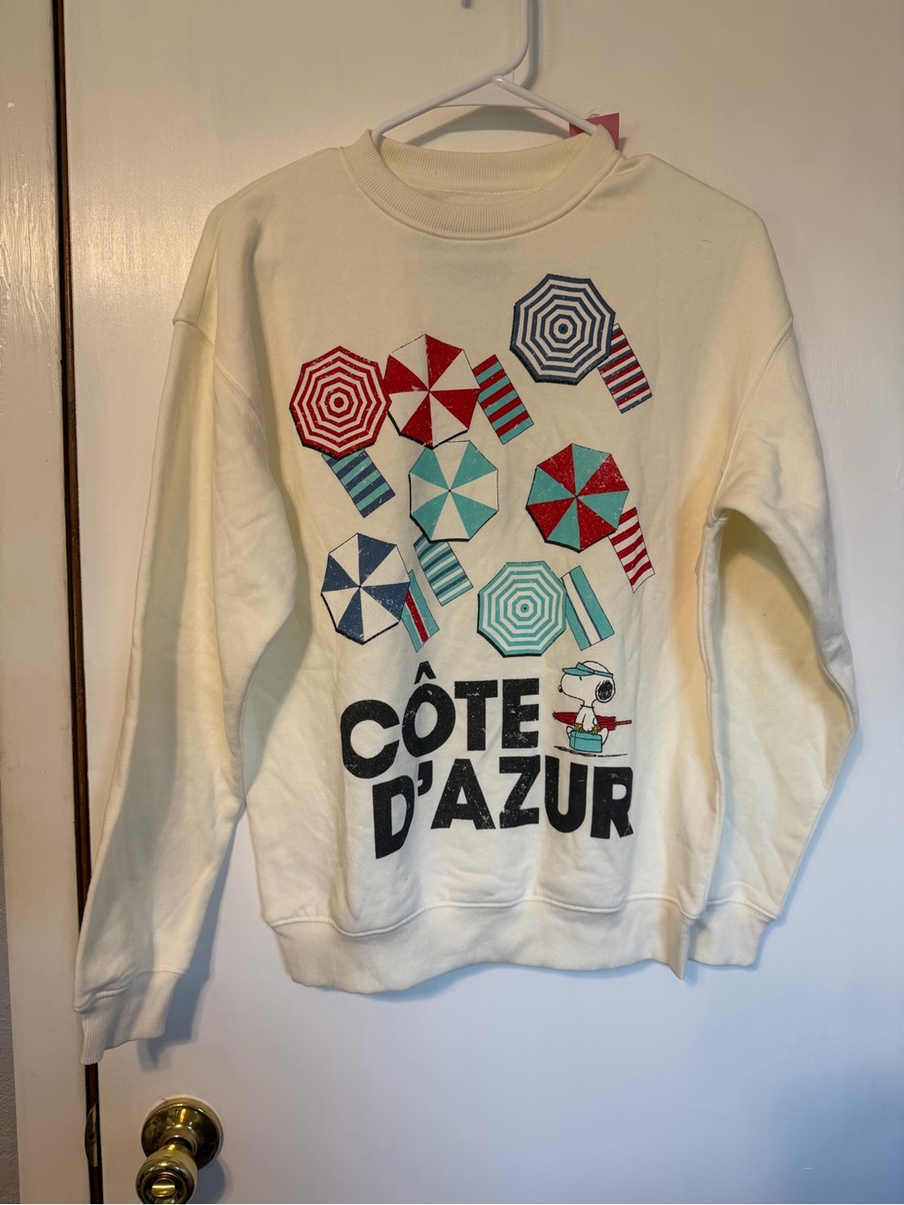 Peanuts Ivory Crewneck Sweater with Red, Blue, Teal & Black Umbrella Graphics